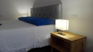 Postel nebo postele na pokoji v ubytování Santa Lucia B&B