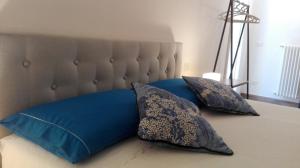 Postel nebo postele na pokoji v ubytování Santa Lucia B&B