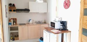 Kuchyňa alebo kuchynka v ubytovaní Apartmán Krajčer
