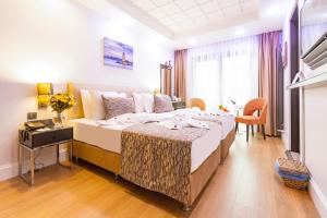 Postel nebo postele na pokoji v ubytování Antusa Design Hotel & Spa