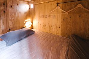 Postel nebo postele na pokoji v ubytování WhyKumano + 37 fotografií