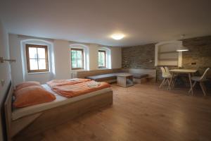 Posteľ alebo postele v izbe v ubytovaní Apartmány Jurica Boží Dar 88
