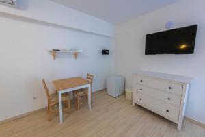 TV a/nebo společenská místnost v ubytování Hullam Rooms Siofok