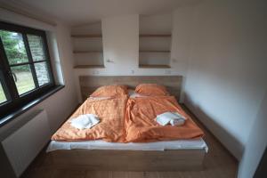Posteľ alebo postele v izbe v ubytovaní Apartmány Jurica Boží Dar 88