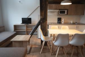 Kuchyňa alebo kuchynka v ubytovaní Apartmány Jurica Boží Dar 88