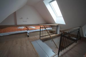 Posteľ alebo postele v izbe v ubytovaní Apartmány Jurica Boží Dar 88
