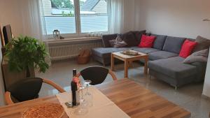 Posezení v ubytování Haus Bramland --- 2 FeWo's --- EG 60qm und OG 55qm