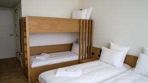 Postel nebo postele na pokoji v ubytování Hotond Sporthotel + 37 fotografií