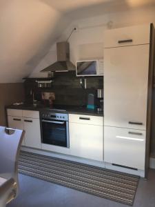 Kuchyň nebo kuchyňský kout v ubytování Ferienwohnung Größing