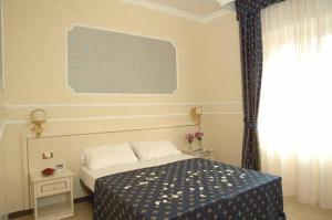 Posteľ alebo postele v izbe v ubytovaní Cesar Palace Guesthouse