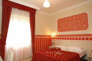 Posteľ alebo postele v izbe v ubytovaní Cesar Palace Guesthouse