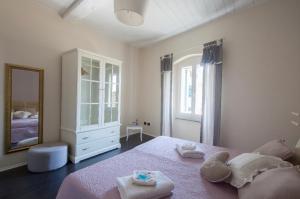 Postel nebo postele na pokoji v ubytování Casa Del Cavaliere