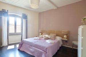 Postel nebo postele na pokoji v ubytování Casa Del Cavaliere