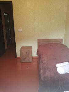 Letto o letti in una camera di Jeiran Japaridze's Guesthouse