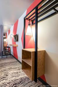 Postel nebo postele na pokoji v ubytování ibis Styles Bâle-Mulhouse Aéroport
