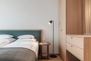 Posteľ alebo postele v izbe v ubytovaní VillaVerde Aparthotel
