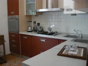 Cuina o zona de cuina de Casa Vacanze "Il Mirto" 19 fotos més