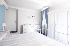 Postel nebo postele na pokoji v ubytování Casa Del Cavaliere