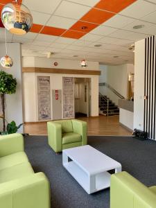 Posezení v ubytování Well Hotel