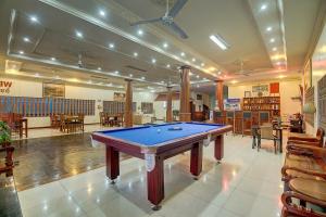 a large room with a pool table in it at DV Angkor Villa in Siem Reap