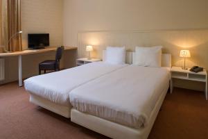 Postel nebo postele na pokoji v ubytování Parkhotel De Bosrand + 23 fotografií