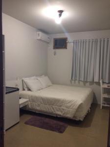 Cama o camas de una habitación en Hengu Hotel
