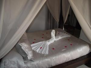Postel nebo postele na pokoji v ubytování Hostal El Canario