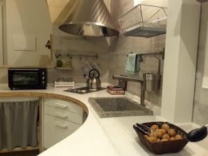 Kuchyň nebo kuchyňský kout v ubytování SASSO BIANCO