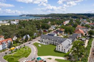 an aerial view of a small town with a lake at AKZENT Apartmenthotel Binz in Binz