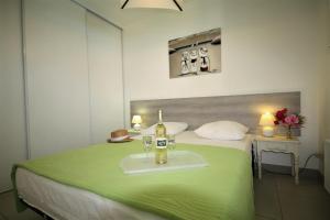 En eller flere senge i et værelse på Résidence la Voile Blanche 4