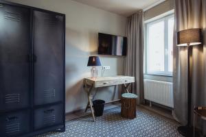 TV a/nebo společenská místnost v ubytování Hotel Goldene Traube - by Neugart