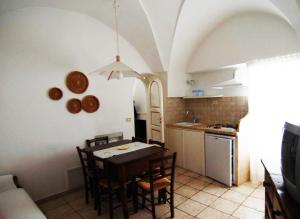 Kuchyň nebo kuchyňský kout v ubytování Villaggio In Case Sparse Nel Centro Storico