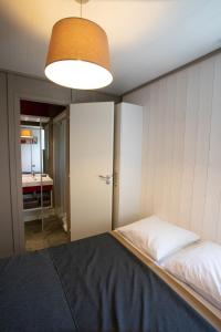 Domaine Chalets Larlapean客房内的一张或多张床位