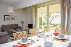 a living room with a white table and chairs at AVIA HOLIDAY HOME 2 in Avia +40 photos