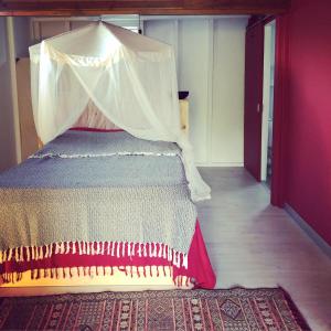 Ein Bett oder Betten in einem Zimmer der Unterkunft Ti coin paradis