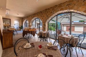 Restaurace v ubytování Borgo di Villa Cellaia Resort & SPA