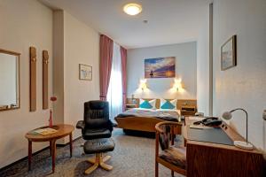 Posezení v ubytování Paulin Hotel Trier