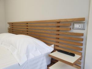 Postel nebo postele na pokoji v ubytování Residence Campo Rotondo