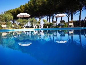The swimming pool at or close to Poggio Verde