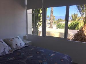 Postel nebo postele na pokoji v ubytování Luxury estudio en Playa Roca a primera linea del mar