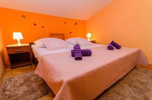 Katil atau katil-katil dalam bilik di Apartments Amico