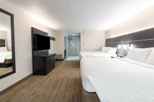 Cama ou camas em um quarto em Holiday Inn Express - Columbus Downtown by IHG