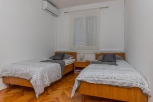 Postel nebo postele na pokoji v ubytování Apartment Svorcan