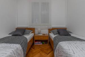 Postel nebo postele na pokoji v ubytování Apartment Svorcan