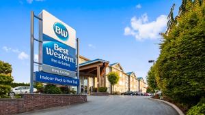 a sign in front of a best western building at Best Western King George Inn & Suites in Surrey