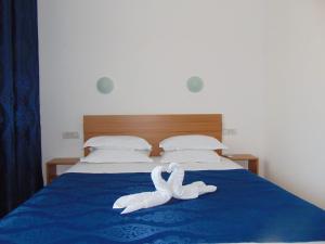 Postel nebo postele na pokoji v ubytování Casa Albatros