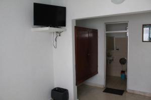 a room with a flat screen tv on a wall at Hotel Casablanca Tuxtla in Tuxtla Gutiérrez +48 photos
