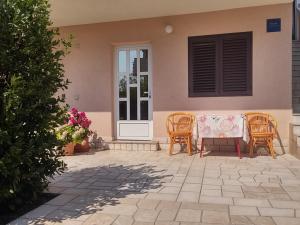Patio alebo iná vonkajšia časť ubytovania Apartments Katarina