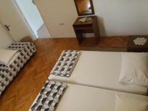 Posteľ alebo postele v izbe v ubytovaní Apartments Katarina