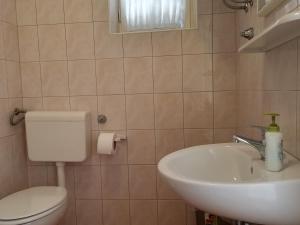 Kúpeľňa v ubytovaní Apartments Katarina